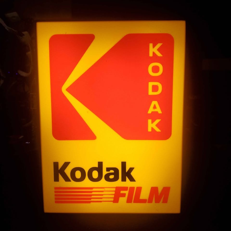 Kodak light up sign with film logo